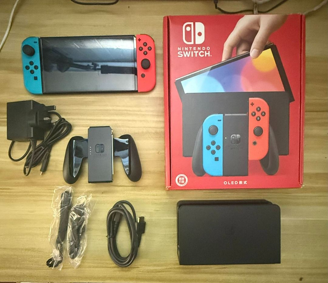 Nintendo Switch OLED with Accessories (Category: Nintendo) located in Pasig City. Submitted by zenforest_1989 (Listing ID 1463787593, Image 1). Description: 🔖 FOR SALE Nintendo Switch Console with Red/Blue Joy-Con (OLED Model) with complete in-box accessories ❌ No Issues Accessories ⭐ Skull & Co. Neo Grip with Maxcarry Case Bundle ⭐ Skull & Co. EDC Case(Unused) ⭐ Skull & Co. Tempered Glass (Unused spare) ⭐ Nyko Thin Case (Unused) ⭐ Dobe Thumbsti