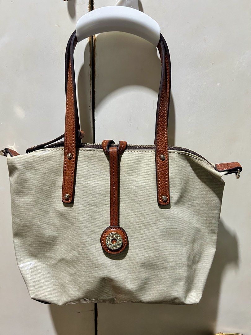 NNM limonta Tote Bag with Leather Trim. Small (Category: Tote Bags) located in Quezon City. Submitted by asiaco (Listing ID 1463779172, Image 1). Description: beige CHIC | Dual-Use LIMONTA Tote Bag by NNM Japan, crafted from Italian LIMONTA fabric with brown leather accents and a magnetic front clasp. No strap included. .