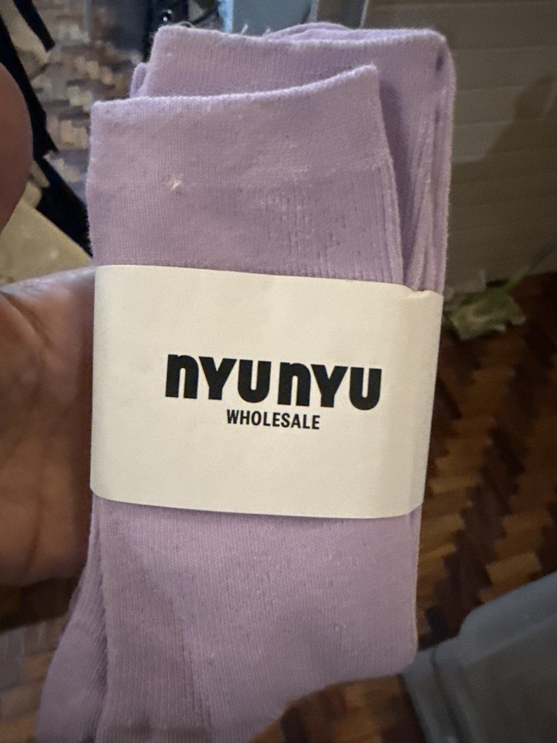 Nyunyu Wholesale Lavender Socks (Category: Socks & Tights) located in Quezon City. Submitted by timoshop (Listing ID 1463894996, Image 1). Description: - Brand: Nyunyu Wholesale - Color: Lavender - Material: Soft and comfortable - Ideal for: Everyday wear - Condition: Comes with original band - Quantity: Sold as a pair.
