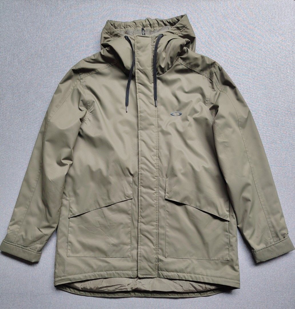Oakley Parka Jacket (Olive Green) (Category: Coats, Jackets and Outerwear) located in Taguig. Submitted by _theroom.ph (Listing ID 1463908247, Image 1). Description: - Oakley hooded jacket in olive green - Full zip front closure - Two convenient front pockets - Quilted lining for added warmth - Adjustable drawstring hood and hem - Ideal for casual wear and outdoor adventures Oakley Parka Jacket (Olive Green) Size Large 30-33 x 23.5 (Fits XL) Exce