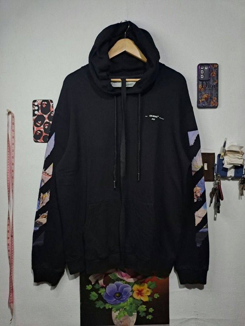Off White Monet Refined Arrow Hoodie (Category: Luxury Apparel) located in Quezon City. Submitted by yaseen73 (Listing ID 1463904197, Image 2). Description: Off White SS19 impressionism Monet Arrow Oil Painting Graphics on the Back and Sleeves Wearing Size : Large Width 24 Length 29 Nearly New Condition Pre - Owned Courier : J&T Lalamove MOP : G C A S H B A N K T R A N S F E R Seller's Location : 📍Brgy. Pansol, Q.C.