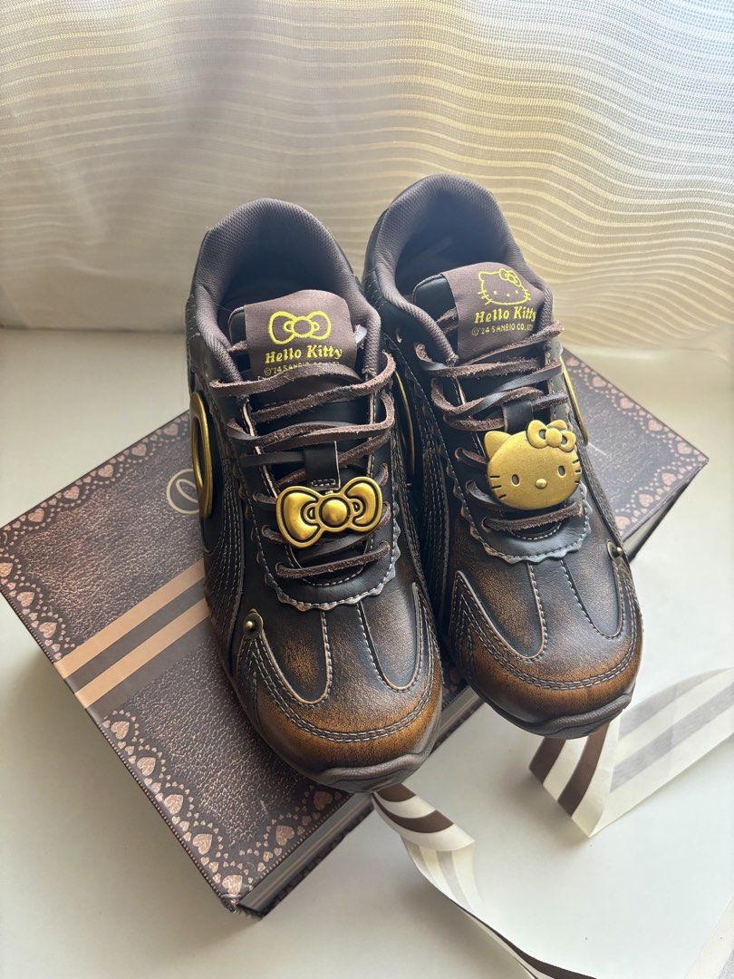 Old Order x Hello Kitty Turbo Lite Runner Sneakers (Category: Sneakers) located in Baguio. Submitted by 01d12 (Listing ID 1463778379, Image 3). Description: Old Order x Hello Kitty Turbo Lite Runner - Brand new; sinukat lang po - RFS: doesn't fit me huhu - Color: Copper Brown - Size: 36 (230) / US 6.5 - Condition: Comes with original box and free inclusions (HK Charms and Foot Shaping Stickers) - retails @ around 7k php sa old order site.