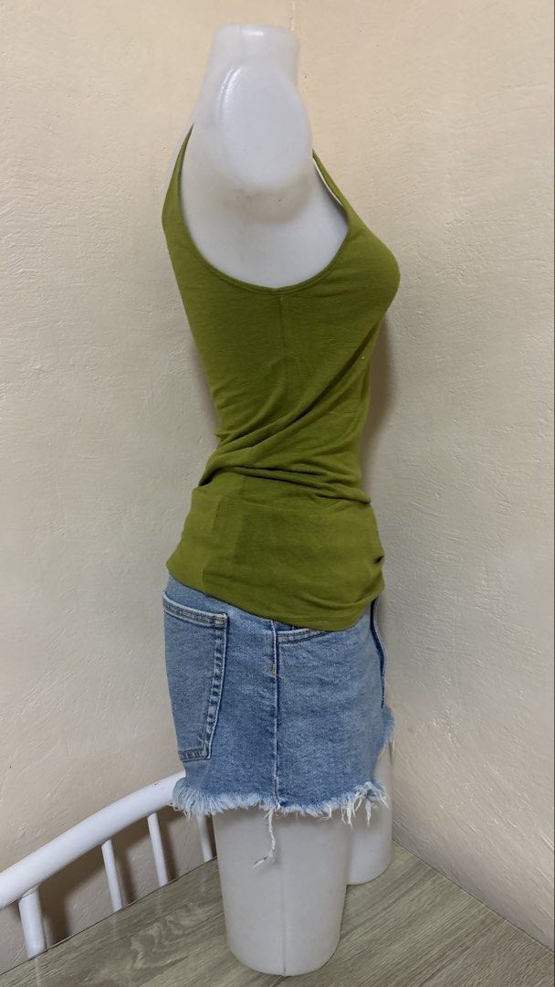 Olive Green Tank Top (Category: Sleeveless) located in Santa Cruz. Submitted by homedecluttersale (Listing ID 1463771402, Image 2). Description: • Fits medium to large • In excellent condition • Photos taken using mannequin only 🚚 Shipping via J&T only 📦 Shipping fee to be shouldered by buyer 💳 Mode of payment: GCash 📍 Santa Cruz, Laguna.