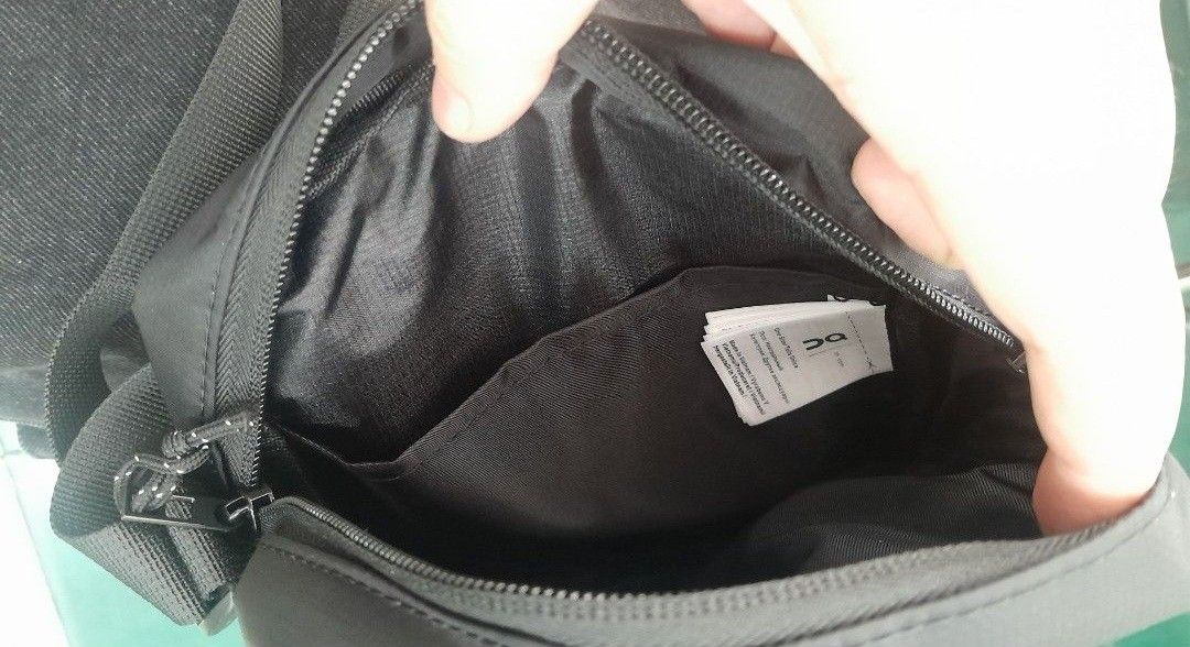 ON Running Black Crossbody Bag (Category: Cross-body Bags) located in Victoria. Submitted by wearnsel (Listing ID 1463806174, Image 2). Description: - Brand: ON Running - Color: Black - Style: Crossbody bag - Size: Small and compact - Features: Main zippered compartment, inner pocket, adjustable strap - Condition: Brand new with tags attached - Ideal for: Daily use, travel, carrying essentials - Bought in Australia.