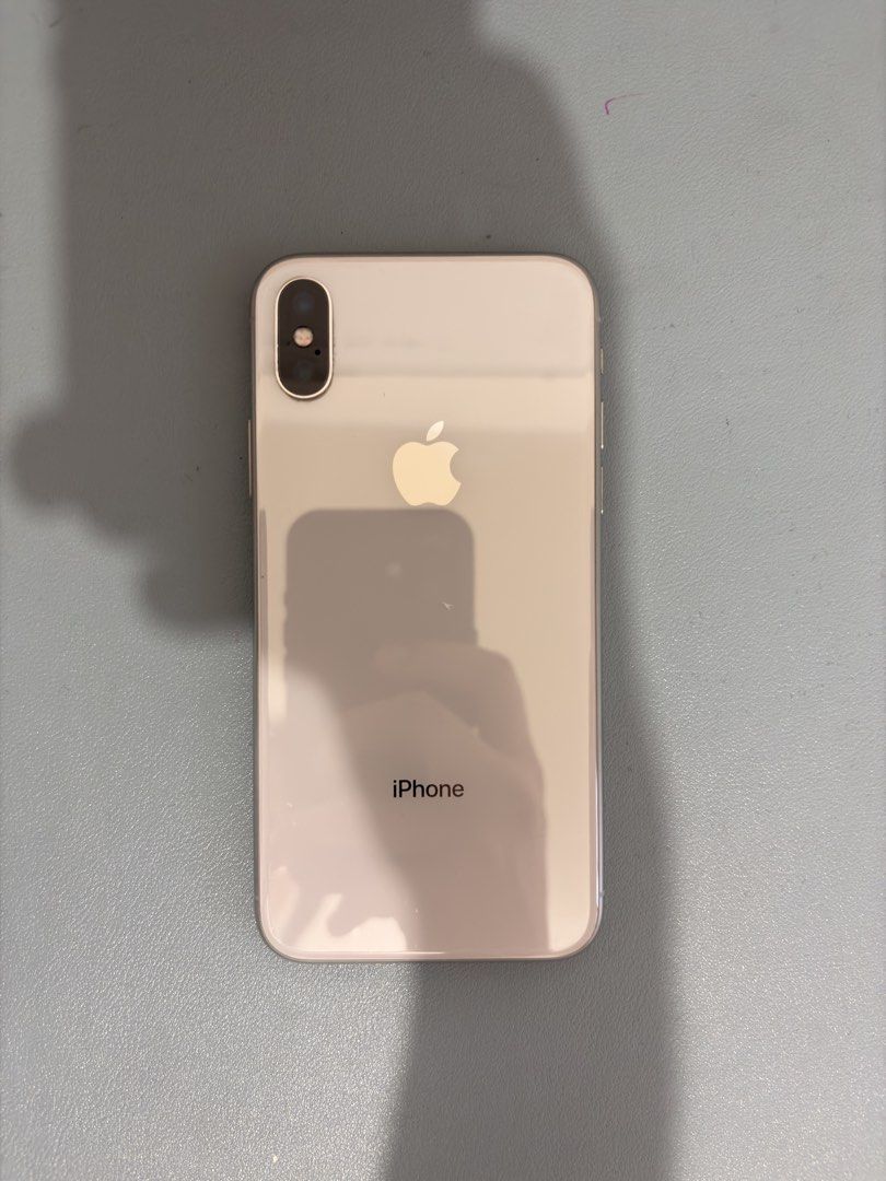 [ONHAND] Iphone X 64gb White (Category: iPhone X Series) located in Laoag. Submitted by pichimilkyy_ (Listing ID 1463787871, Image 1). Description: - onhand, ready to ship - 100% BH | replaced - 64 gb - color white - battery can last up to 5hrs depending on the apps you use - recommended as spare phone only - no back & front scratches but has a slight crack at the top right corner inclusions: - unit only - 3 cases - installed tempered glass mop: 