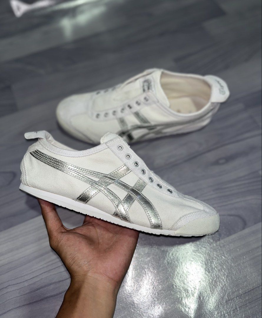 Onitsuka Tiger Mexico 66 White Silver Sneakers (Category: Sneakers) located in Dipolog. Submitted by thirftnikaloy (Listing ID 1463838372, Image 2). Description: Onitsuka Tiger Mexico 66 Slip-On SILVER WHITE Size: 9 US / 42.5 EUR / 27 CM Condition: 9/10 VERY MINIMAL DRAGS ( NO ISSUE) Loc: DIPOLOG CITY PHP: 1800 PLUS SHIPPING FEE UNLI VOUCH VC FOR SAGE TRANSACTION AUTHENTIC / UKAY SOURCE #PTPADMINTHANKS.