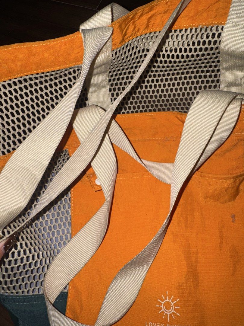 Orange Beach Bag (Category: Beach Bags) located in Quezon City. Submitted by mkl.p (Listing ID 1463883545, Image 3). Description: - with front pocket - buttons only/no zippers - very spacious inside - BTV Inspired - needs laundry - got this from thailand - no flaws/slightly used only loc timog qc.