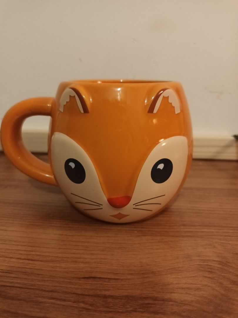 Orange Fox Face Mug with Friendship Quote (Category: Coffee & Tea Tableware) located in Cavite. Submitted by fundamentally (Listing ID 1463904911, Image 2). Description: - Orange mug featuring a cute fox face design. - Back of the mug reads: 'Friendship is a promise kept'..