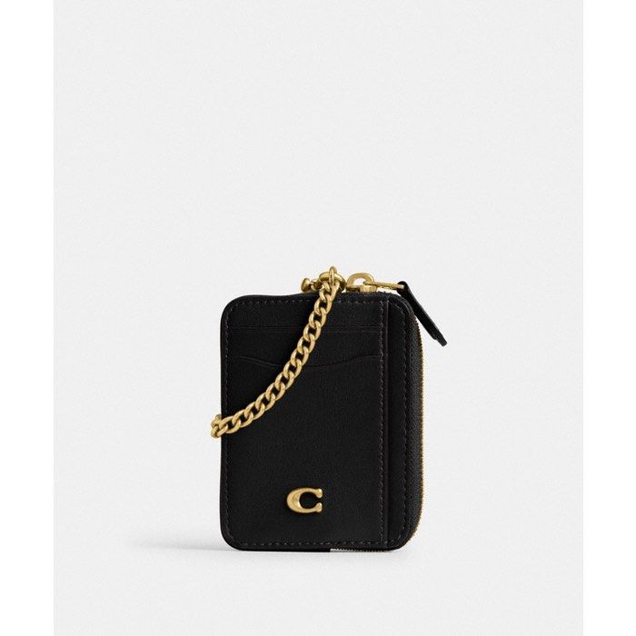 💯ORIGINA COACH ESSENTIAL CARD CASE (Category: Wallets & Card holders) located in Quezon City. Submitted by ashongsstore (Listing ID 1463781456, Image 2). Description: 👜 C🅾️ACH COLLECTION👜 🇵🇭AVAILABLE🇵🇭 ESSENTIAL CHAIN CARD CASE Crafted of refined leather detailed with our Signature hardware, this zip-compartment case keeps cards, ID, keys and other small essentials secure. Clip the chain strap to a belt loop or inside a bag. DETAILS: Refi