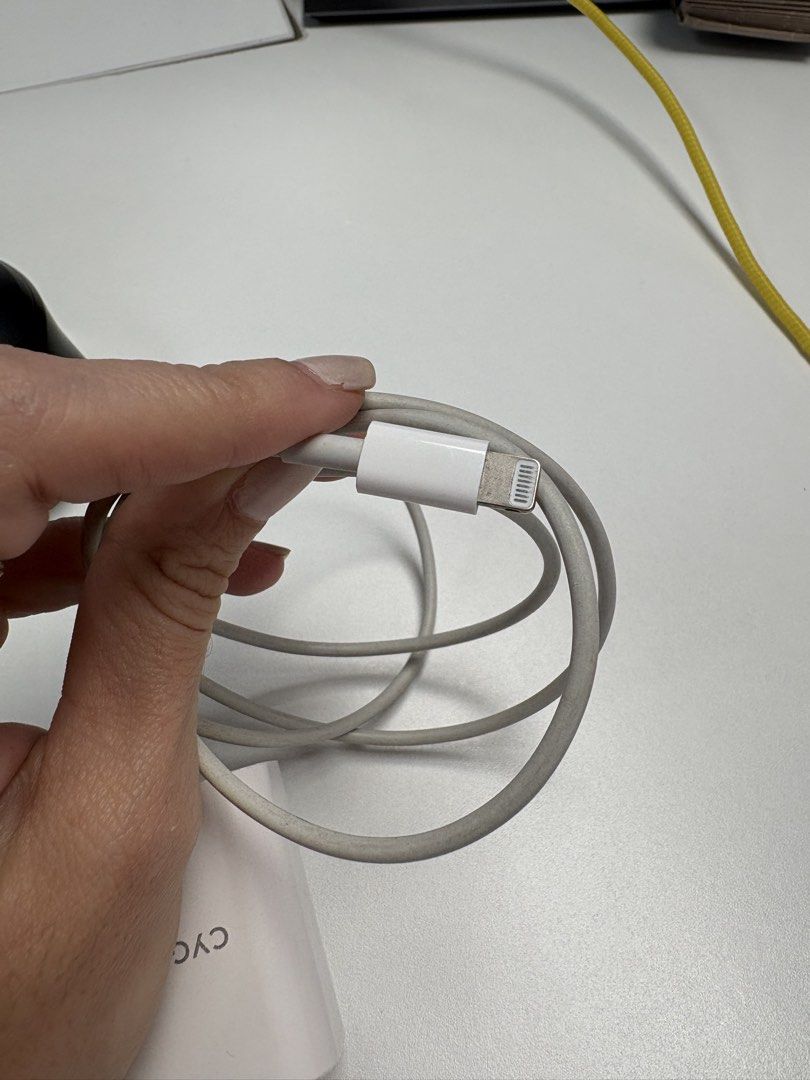 Original Apple lightening cable with plug box. Free charger protector (Category: Chargers & Cables) located in Makati City. Submitted by pamimaia (Listing ID 1463819849, Image 3). Description: - Original Apple Lightning cable and power adapter set. - Comes with a free cute charger protector. - Cable and adapter are white. - Charger adapter features 'CYGNETT' branding. - Meetup options available in Ortigas. .