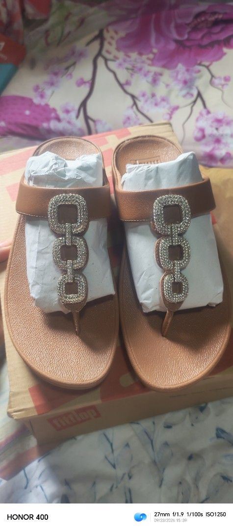 Original fitflop size us6 (Category: Flats & Sandals) located in Manila. Submitted by hanietol23240 (Listing ID 1463933383, Image 3). Description: - Brand: FitFlop - Style: Flip-flops - Perfect for everyday wear - Available colors & embellishments: - Black: Sparkly details - Pink: Decorative stones - Tan: Square embellishments with rhinestones.