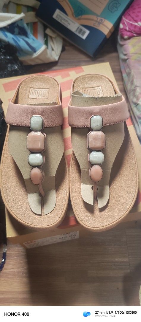 Original fitflop size us6 (Category: Flats & Sandals) located in Manila. Submitted by hanietol23240 (Listing ID 1463933383, Image 2). Description: - Brand: FitFlop - Style: Flip-flops - Perfect for everyday wear - Available colors & embellishments: - Black: Sparkly details - Pink: Decorative stones - Tan: Square embellishments with rhinestones.
