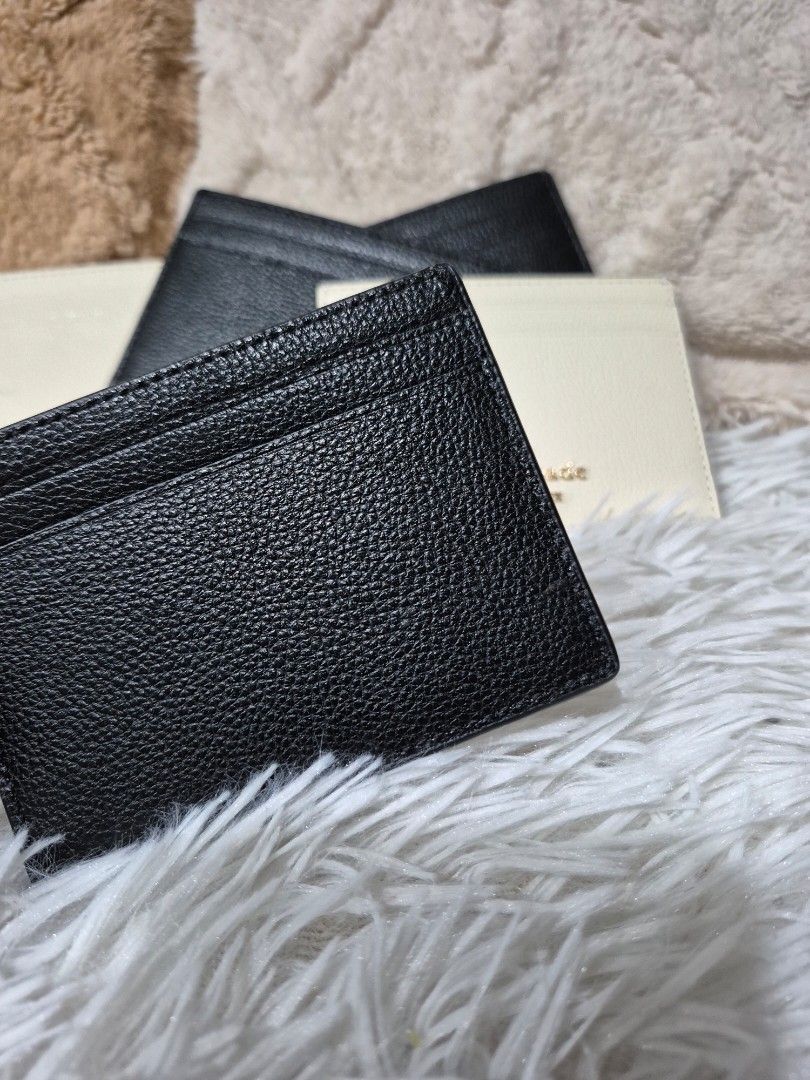 Original Kate Spade Slim Card Holder (Category: Wallets & Card holders) located in Cavite. Submitted by chaellebrandsluxe (Listing ID 1463804468, Image 3). Description: Selling low, no inclusion LP Posted already.