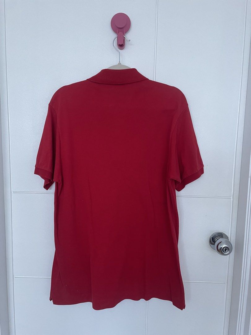 Original Lacoste Red Polo Shirt Size 4 (Category: Tshirts & Polo Shirts ) located in Quezon City. Submitted by sunday_thrifts (Listing ID 1463785312, Image 2). Description: - Classic red Lacoste polo shirt - Iconic crocodile logo on chest - Made in Japan - Size 4 - Versatile for casual or sporty looks - Timeless and simple design.