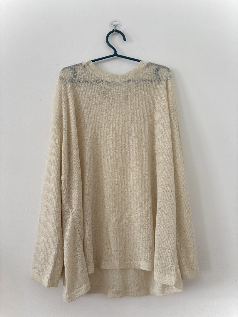 Oversized Beige/Cream Knit Sweater (Category: Coats, Jackets and Outerwear) located in Cebu City. Submitted by cherrysclutter (Listing ID 1463841450, Image 1). Description: - Cream colored knit sweater - Relaxed fit - Textured material for a comfy feel - Versatile for layering or wearing alone Flat Measurements (inches) Waist: 26, up to 42 if stretched Arms: up to 14 Front length: 25.5 Back length: 28.5.