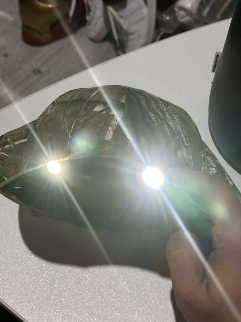 Paramount Outdoors Realtree Hat with Headlight (New Battery) (Category: Caps & Hats) located in Daet. Submitted by thrifthings2018 (Listing ID 1463847918, Image 2). Description: - Paramount Outdoors hat in Realtree camouflage - Built-in LED headlight with a brand new battery - Ideal for hunting, fishing, camping, or any outdoor activity - Also great for working in dimly lit conditions - Adjustable strap for a secure and comfortable fit - Ready fo