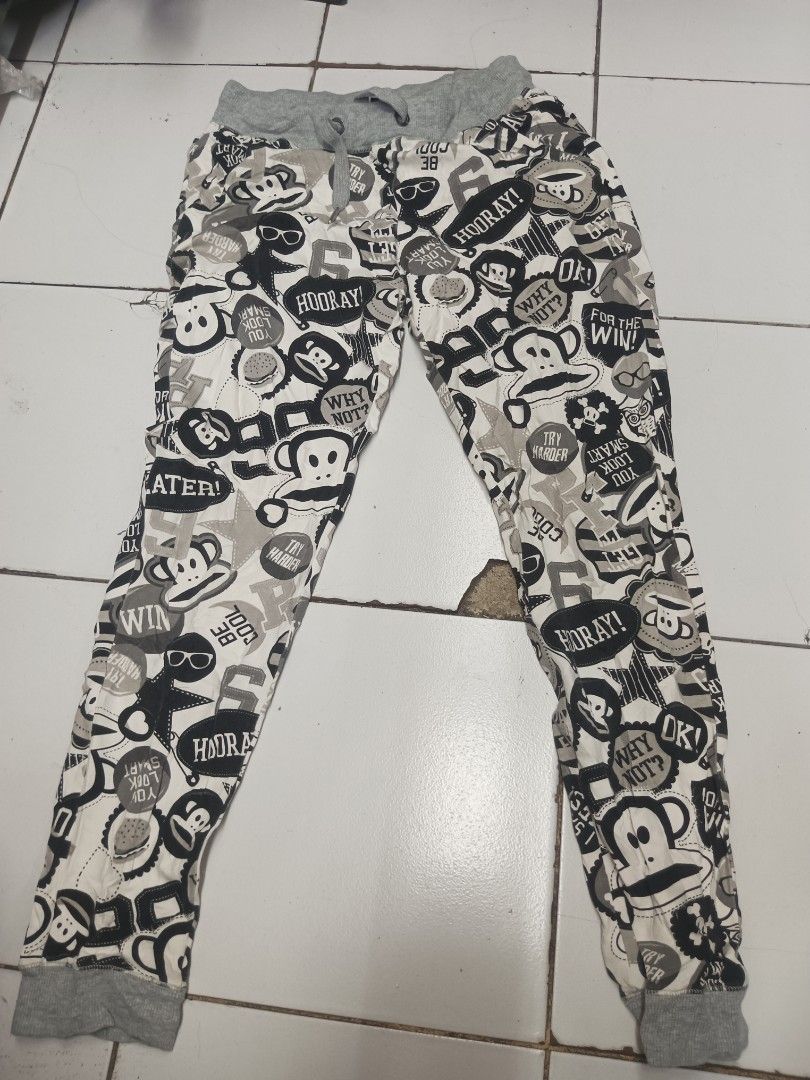 Paul Frank Womens Jogger Pants Size M (Category: Jeans) located in Tarlac. Submitted by jeffanna1142070 (Listing ID 1463778778, Image 1). Description: - Fun all-over print featuring Julius the monkey and phrases - Elastic waistband with adjustable drawstring - Ribbed cuffs and waistband for a comfortable fit - Size: Medium (M) - Material: Made in China.