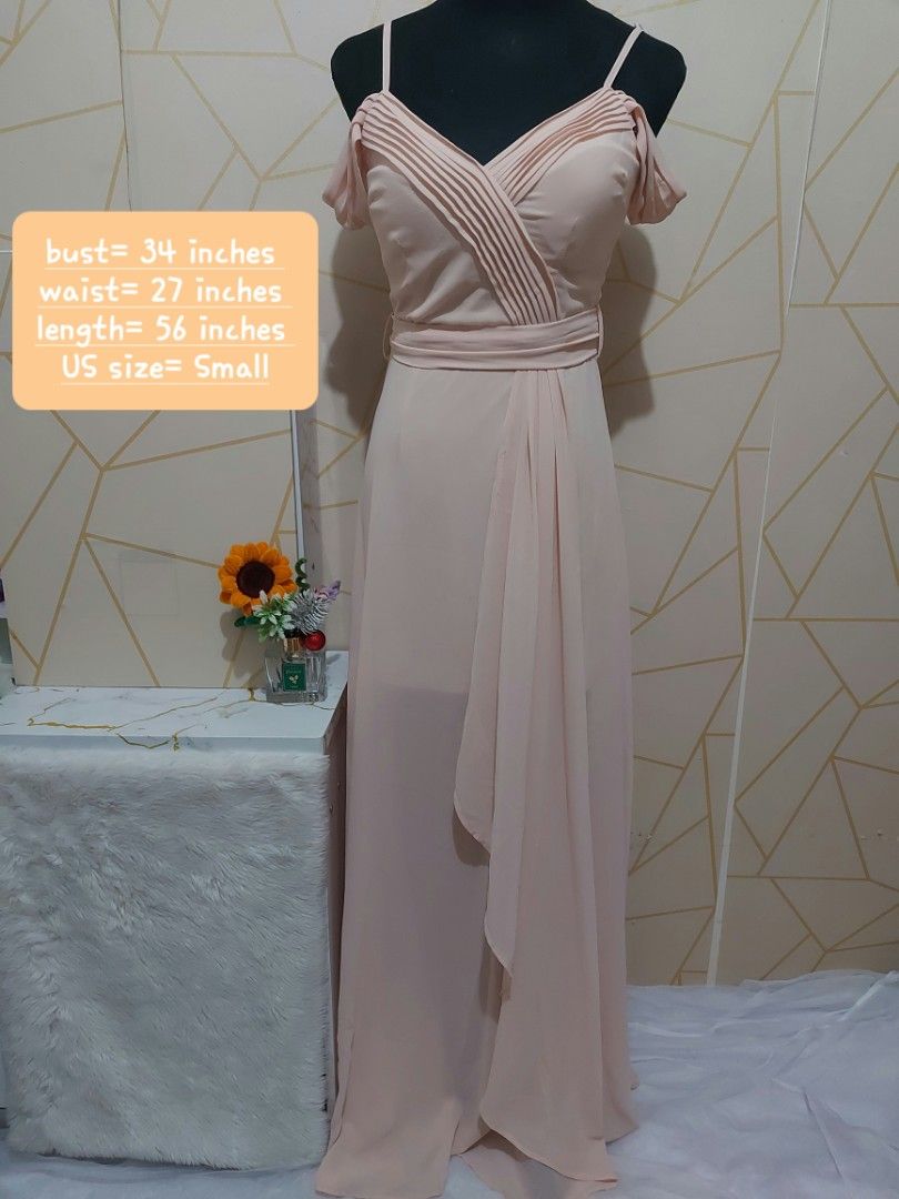Peach Cold Shoulder Pleated Maxi Dress(small) (Category: Dresses) located in Manila. Submitted by jollyann_b1990 (Listing ID 1463812042, Image 1). Description: - Beautiful peach maxi dress - Cold shoulder design with short sleeves - Flattering V-neckline with pleated detailing - Cinched waist with a tie for a defined silhouette - Flowy skirt for graceful movement - Convenient back zipper closure - Ideal for events and formal occasions.