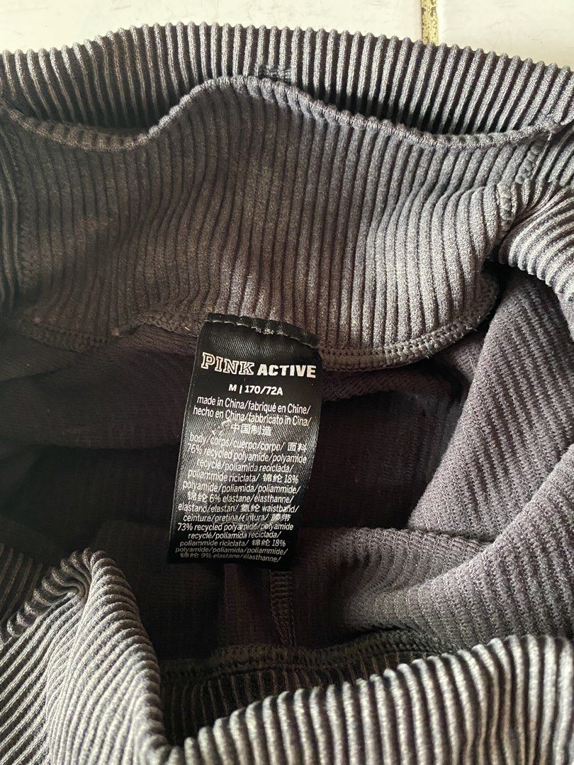 PINK Active Seamless Ribbed Joggers / Leggings ✨ (Category: Other Bottoms) located in Bayambang. Submitted by cartier777 (Listing ID 1463774149, Image 3). Description: Brand: Victoria’s Secret PINK (PINK Active) Size: Medium (M | 170/72A) Color: Charcoal Grey / Washed Black Material: Premium ribbed knit blend with stretchy elastane for a snug, flattering fit. Features: High-waisted, wide elastic waistband with drawstring closure Tonal "PINK" logo