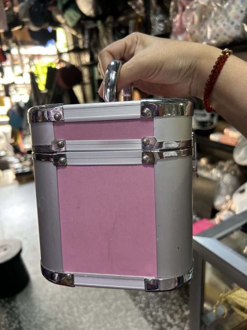 Pink and Silver Makeup Vanity Case with Handle and Lock (Category: Luxury Bags & Wallets) located in Manila. Submitted by starbalesukandjapansurplus (Listing ID 1463759974, Image 2). Description: - Adorable pink and silver makeup case - Features a sturdy handle for easy carrying - Secure lock closure to keep contents safe - Compact size, perfect for travel or everyday use - Great for storing makeup or small accessories.
