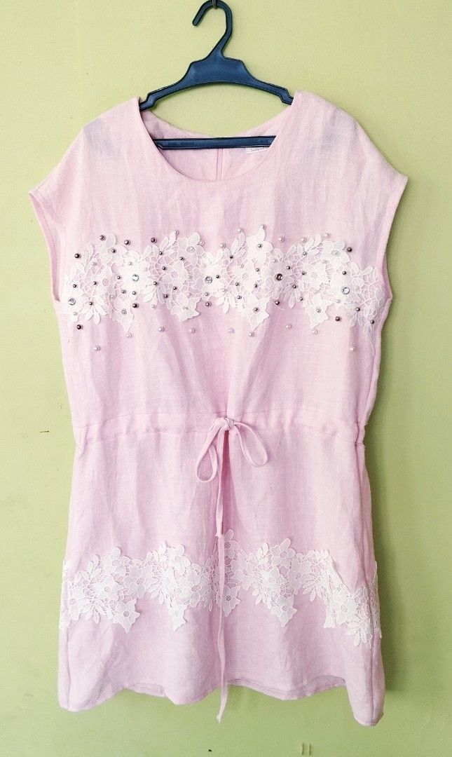 Pink Lace & Pearl Mini Dress (Category: Dresses) located in Ozamiz City. Submitted by ng.thrifts (Listing ID 1463749497, Image 1). Description: - Cute pink mini dress - Short sleeves - Lace and pearl embellishments on chest - Drawstring waist for a cinched look - Lace detail at the hem - Lightweight fabric, ideal for warm weather - Versatile for dressing up or down.