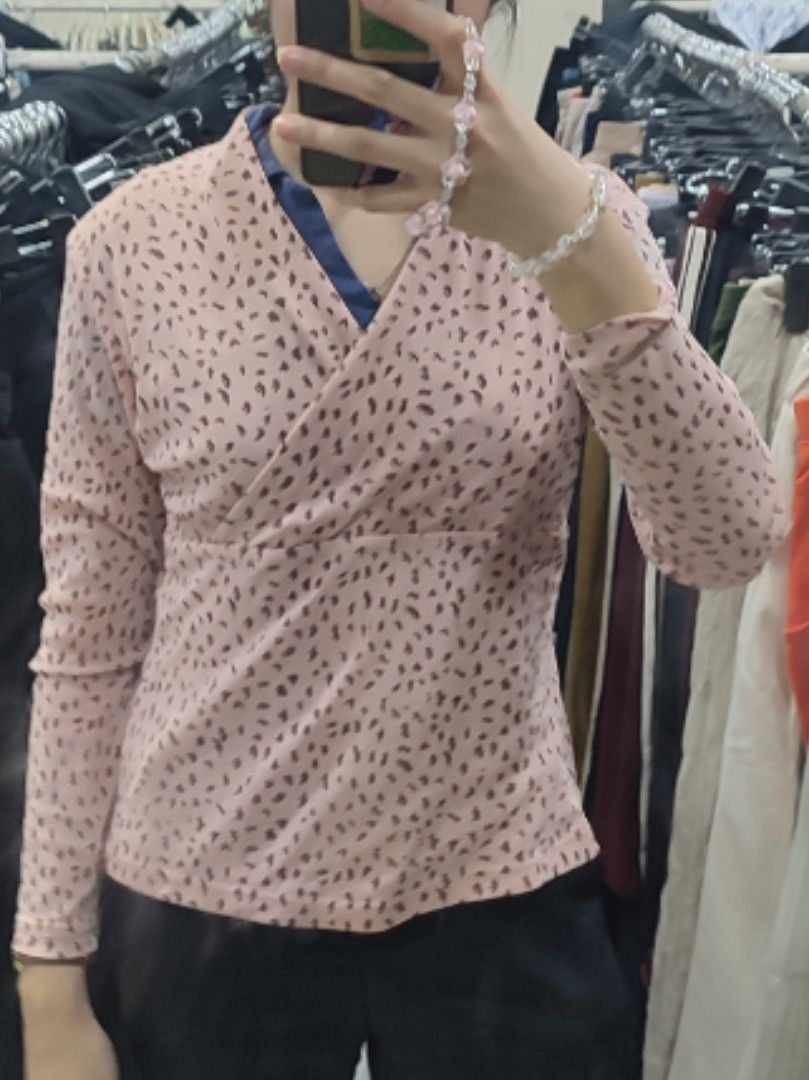 Pink Leopard Print Wrap Top by Emma (Category: Sleeveless) located in Jaen. Submitted by roxantiago (Listing ID 1463780275, Image 2). Description: - Cute pink top with a trendy brown leopard print. - Brand: Emma - Style: Wrap V-neck with long sleeves. - Versatile: Dress it up or down. - Perfect pairing: Looks great with jeans or skirts..