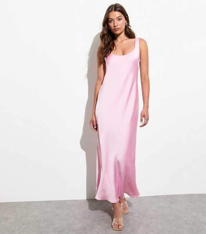 Pink long satin dress (Category: Dresses) located in Taytay. Submitted by murahubblueapppage (Listing ID 1463930860, Image 1). Description: Made in vietnam Size :m on tag Bust : 36 Waistline :28 Long : 55 inches from shoulder .