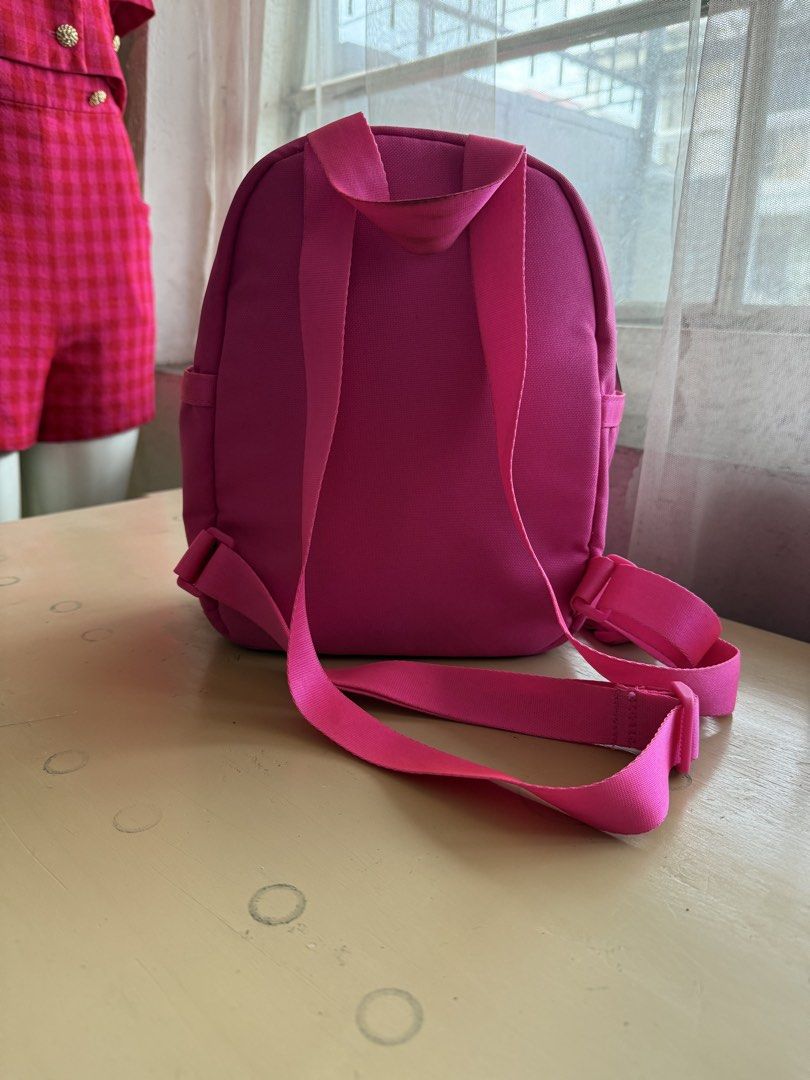 Pink Nike Mini Backpack (Category: Backpacks) located in Cabuyao City. Submitted by arral (Listing ID 1463782009, Image 2). Description: - Cute pink Nike mini backpack - Features a front zip pocket - Adjustable straps for a comfortable fit - Ideal for carrying essentials on a day out - Made with durable and easy-to-clean material.