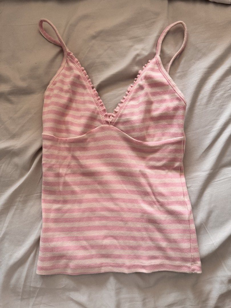 Pink Striped V Neck Tank Top (Category: Sleeveless) located in Pasig City. Submitted by lovedpicks (Listing ID 1463744514, Image 1). Description: - Brand: Bershka - Style: V-Neck Tank Top - Color: Pink and White Stripes - Fits XS-M! - Condition: Great - Features: Sleeveless, ribbed fabric.