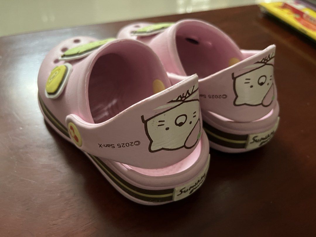 Pink Sumikko Gurashi Clogs for Kids Size 16cm (Category: Babies & Kids Fashion) located in Quezon City. Submitted by muffet9 (Listing ID 1463776817, Image 3). Description: - Authentic Bought in Japan - used a few times onlu, outgown quickly - very cute and comfy - fits 3-4 years old -sole not pudpod, worn indoors in preschool or mall only - Adorable pink clogs for kids - Features cute Sumikko Gurashi characters - Decorated with fun lemon charms -