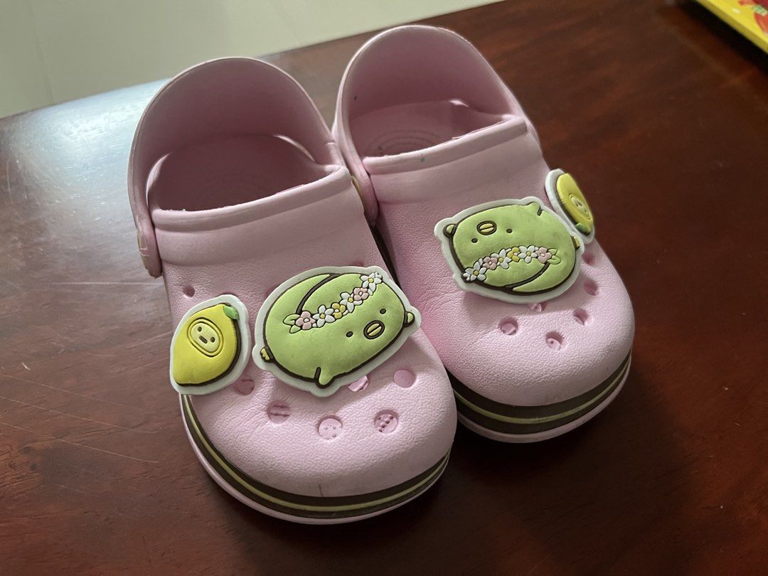 Pink Sumikko Gurashi Clogs for Kids Size 16cm (Category: Babies & Kids Fashion) located in Quezon City. Submitted by muffet9 (Listing ID 1463776817, Image 2). Description: - Authentic Bought in Japan - used a few times onlu, outgown quickly - very cute and comfy - fits 3-4 years old -sole not pudpod, worn indoors in preschool or mall only - Adorable pink clogs for kids - Features cute Sumikko Gurashi characters - Decorated with fun lemon charms -
