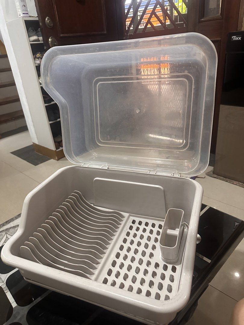 Plastic Dish Rack with Lid and Cutlery Holder (Category: Food Organization & Storage) located in Manila. Submitted by zuripot0726 (Listing ID 1463820317, Image 2). Description: - Plastic dish rack with a lid - Separate sections for plates and cutlery - Lid helps keep dust away - Ideal for drying dishes and maintaining a tidy kitchen - Features an under-tray to catch water - Easy to clean and store.