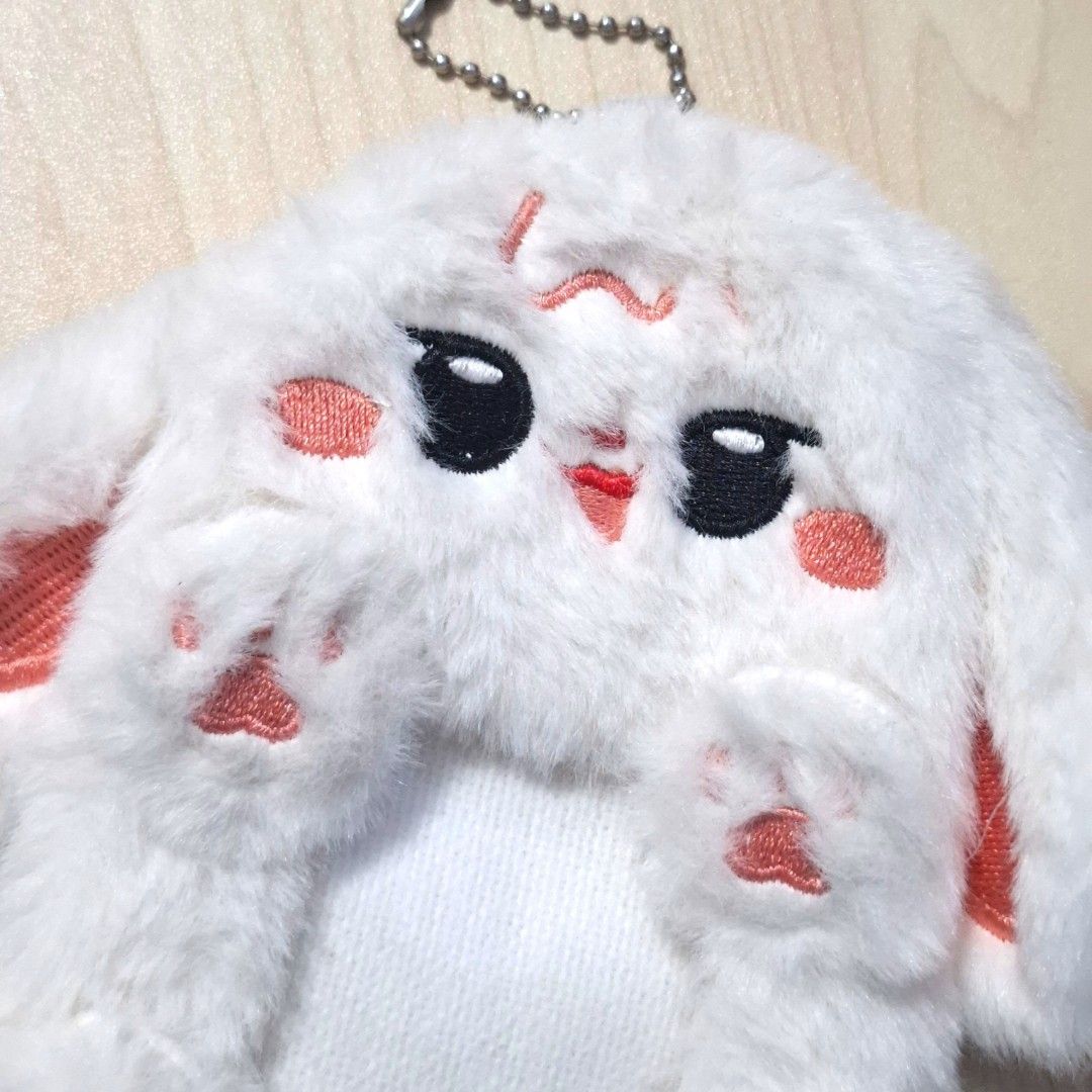 Plushy Card sleeve Keychain Bag (Category: Plushies & Soft Toys) located in Quezon City. Submitted by an.marie (Listing ID 1463815017, Image 2). Description: Super cute fluffy white bunny pouch with keychain. Perfect for coins, keys, or earbuds. Soft and cuddly, with embroidered details. A fun accessory for bags!.