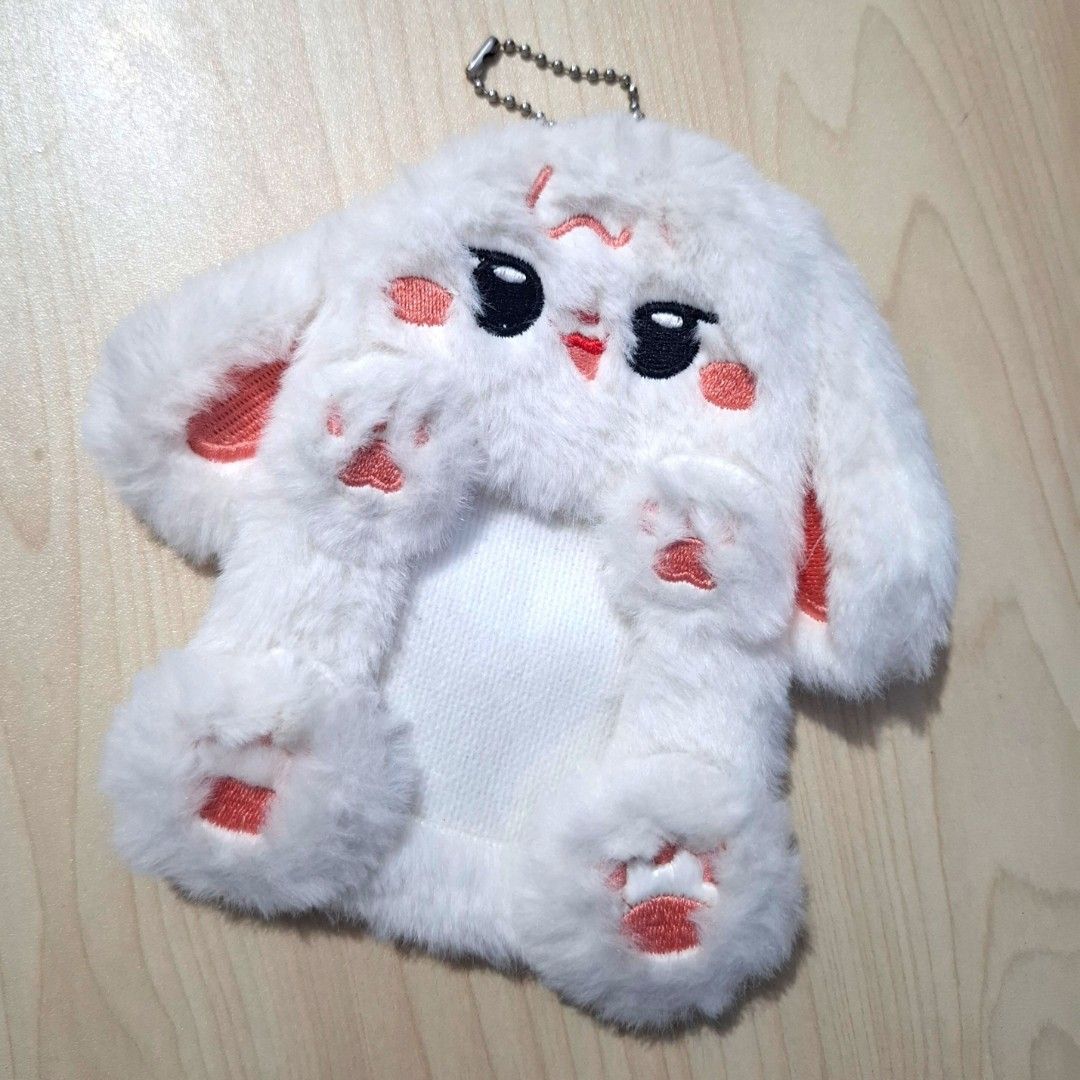 Plushy Card sleeve Keychain Bag (Category: Plushies & Soft Toys) located in Quezon City. Submitted by an.marie (Listing ID 1463815017, Image 1). Description: Super cute fluffy white bunny pouch with keychain. Perfect for coins, keys, or earbuds. Soft and cuddly, with embroidered details. A fun accessory for bags!.