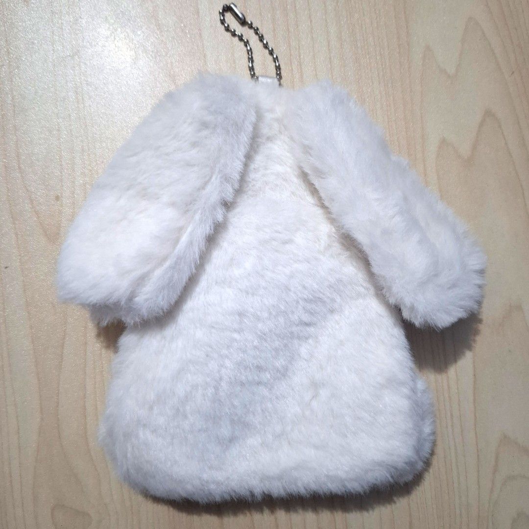 Plushy Card sleeve Keychain Bag (Category: Plushies & Soft Toys) located in Quezon City. Submitted by an.marie (Listing ID 1463815017, Image 3). Description: Super cute fluffy white bunny pouch with keychain. Perfect for coins, keys, or earbuds. Soft and cuddly, with embroidered details. A fun accessory for bags!.