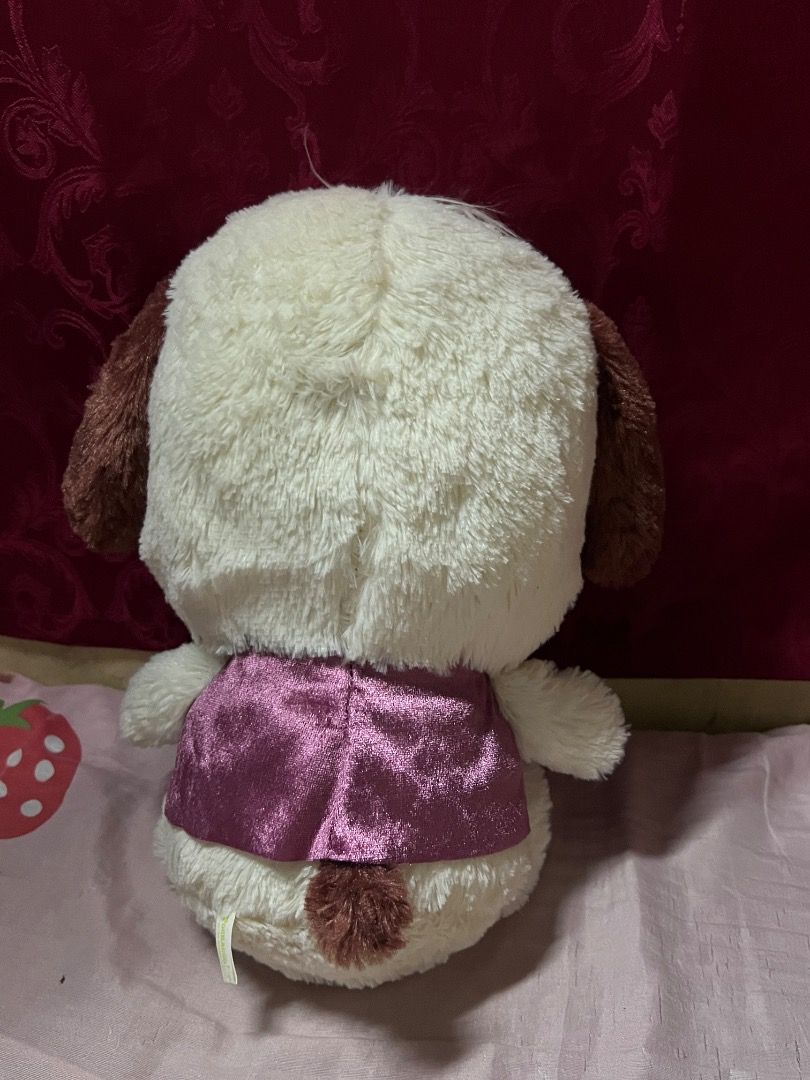 Pochacco Plush Dog Sanrio (Category: Plushies & Soft Toys) located in Bulacan. Submitted by haven_plushie_dolls.888 (Listing ID 1463844563, Image 2). Description: - Adorable Pochacco plush toy - Cream color with brown ears and tail - Features a sparkly purple vest with a satin bow - Super soft and cuddly - Ideal for Sanrio collectors and fans - Great for decoration or playtime.