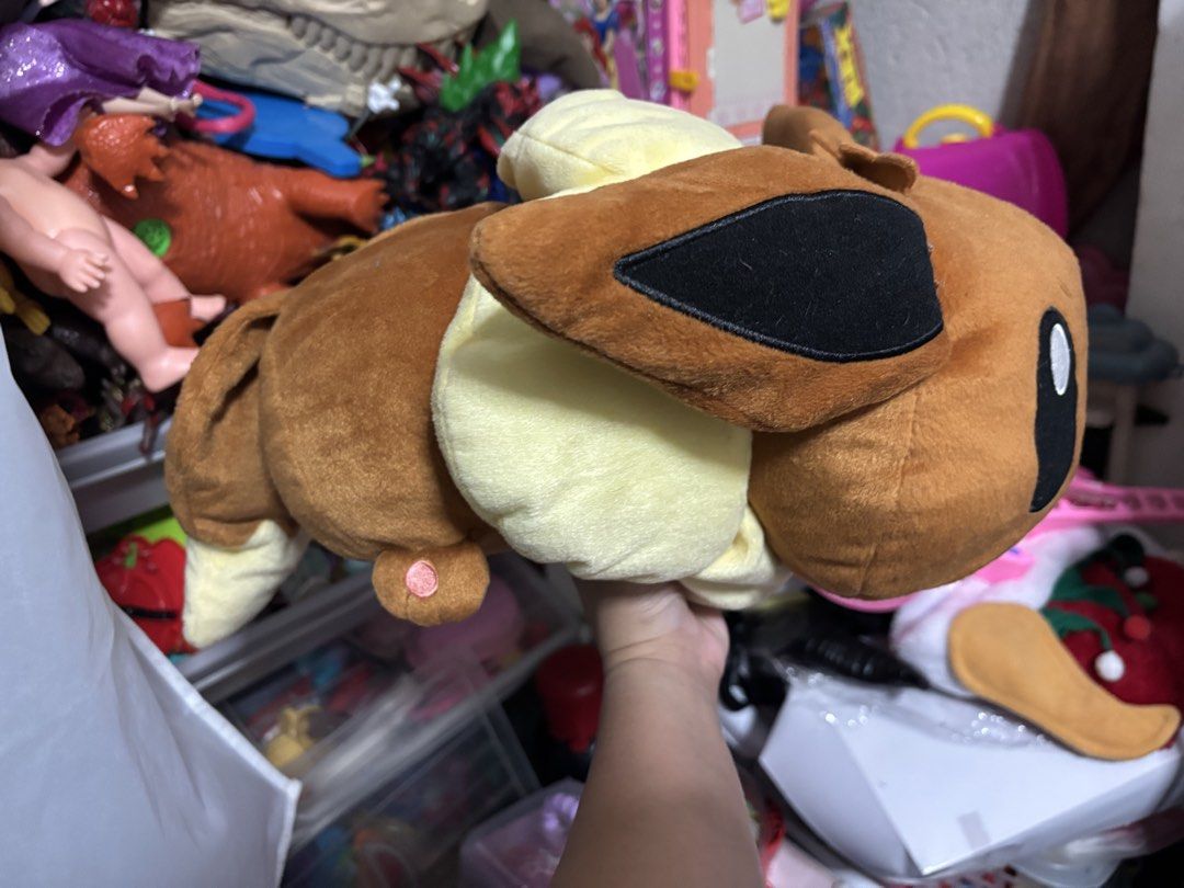 Pokemon Eevee Plush Toy (Category: Plushies & Soft Toys) located in Pasig City. Submitted by genyzk (Listing ID 1463812022, Image 2). Description: - Soft and cuddly Eevee plush toy - Ideal for any Pokemon fan - Perfect for display or play.