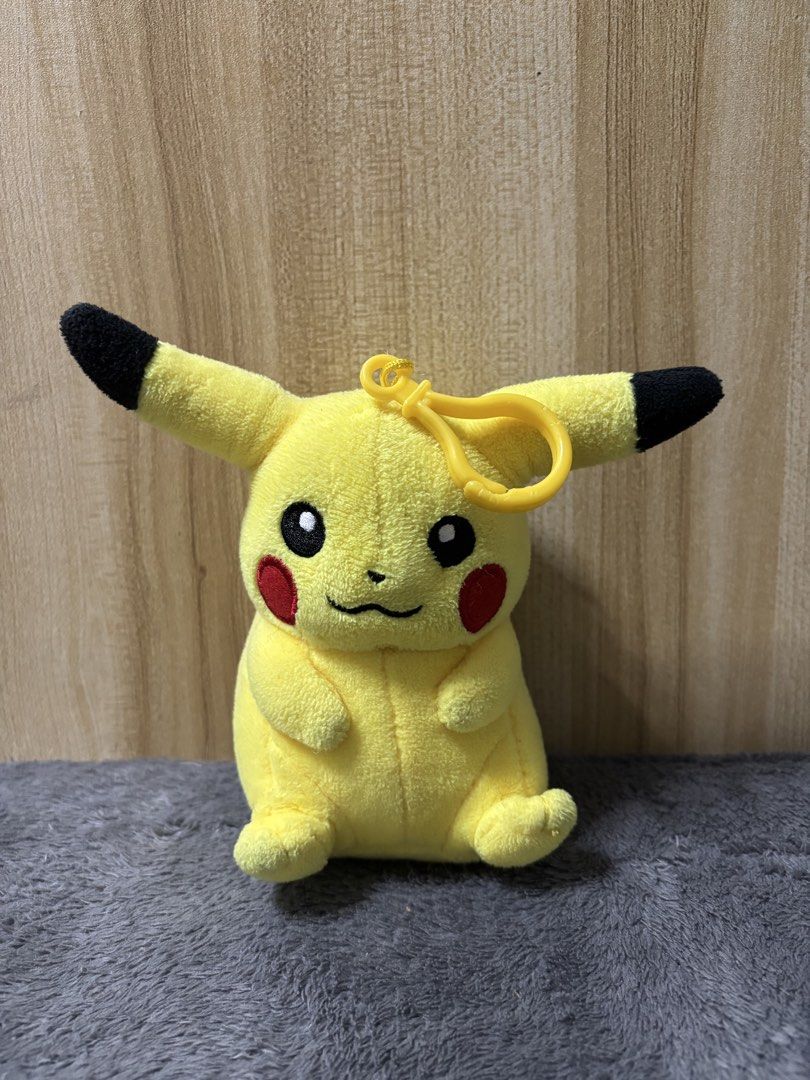 Pokemon Pikachu Plush Toy Keychain (Category: Plushies & Soft Toys) located in Pasig City. Submitted by genyzk (Listing ID 1463812155, Image 1). Description: - Adorable Pikachu plush toy - Features a convenient keychain attachment - Soft and cuddly material - Compact and portable size, ideal for bags and backpacks - A must-have for any Pokemon enthusiast.