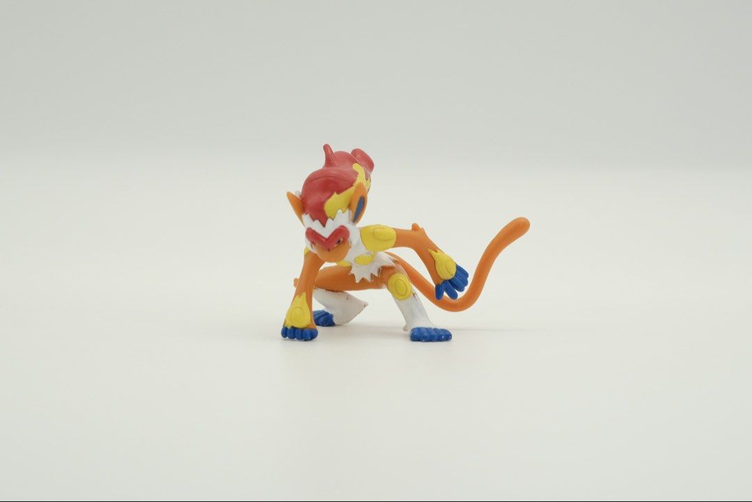 Pokemon TOMY Infernape Figure (Category: Figurines & Statues) located in Nasugbu. Submitted by achamocollects (Listing ID 1463764274, Image 1). Description: - Pokemon Infernape action figure - Approximately 3-4 inches tall - Vibrant orange body with red and yellow accents - Distinctive blue hands and feet - Ideal for any Pokemon enthusiast or collector - Ready to find a new home!.