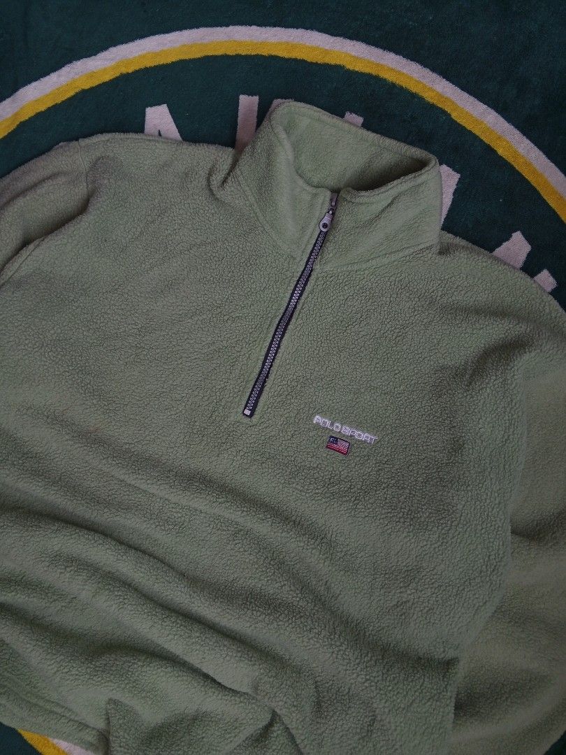 Polo Sport Ralph Lauren Fleece Half Zip Pullover (Category: Announcements) located in Las Pinas. Submitted by allhandpick (Listing ID 1463808213, Image 2). Description: - Light green fleece pullover from Polo Sport - Features a half-zip neckline - Polo Sport logo on the chest - Made of 100% cotton - Super comfy and warm - Great for layering or wearing on its own - Classic wardrobe piece.