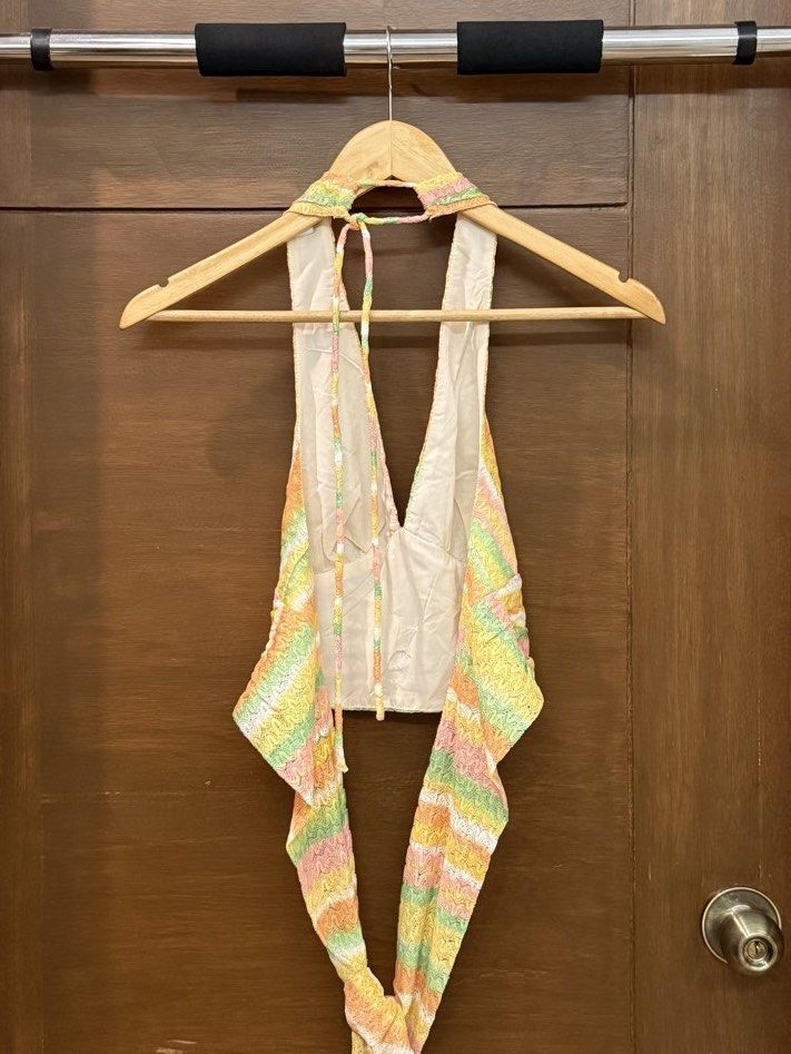 Pomelo Stripe Print Crop Halter Top in Multicolor (Category: Sleeveless) located in Tarlac. Submitted by samdeclutters_ (Listing ID 1463665104, Image 3). Description: - Size: XS - Fabric: Polyester - Part of the brand’s vibrant retro-inspired collection; nostalgic 70s prints and colors - Worn once - RFS: Not my style anymore.