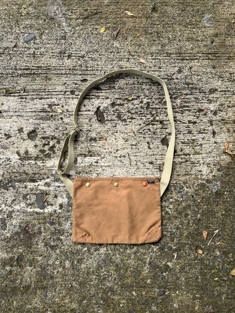 PORTER Japan shoulder bag Sacoche Brown (Category: Sling Bags) located in Valencia. Submitted by hunterxthrifter (Listing ID 1463798549, Image 1). Description: GOOD AS NEW NO ISSUE AUTHENTIC GUARANTEED ADJUSTABLE STRAP BROWN/ TAN .