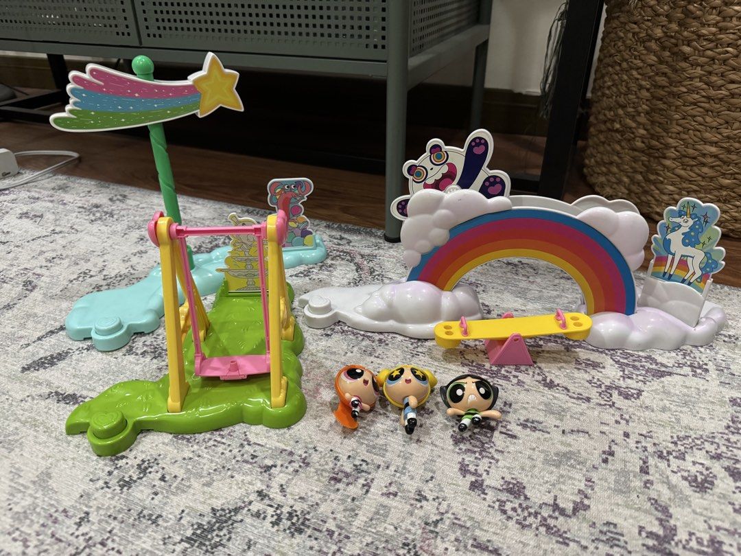Powerpuff Girls Playset with Figures (Category: Kids Toys) located in Quezon City. Submitted by kcapi (Listing ID 1463789795, Image 1). Description: - Fun Powerpuff Girls playset - Features a swing, rainbow arch, and seesaw - Includes Blossom, Bubbles, and Buttercup figures - Encourages imaginative play - Main structures are complete - Ideal for any Powerpuff Girls fan.