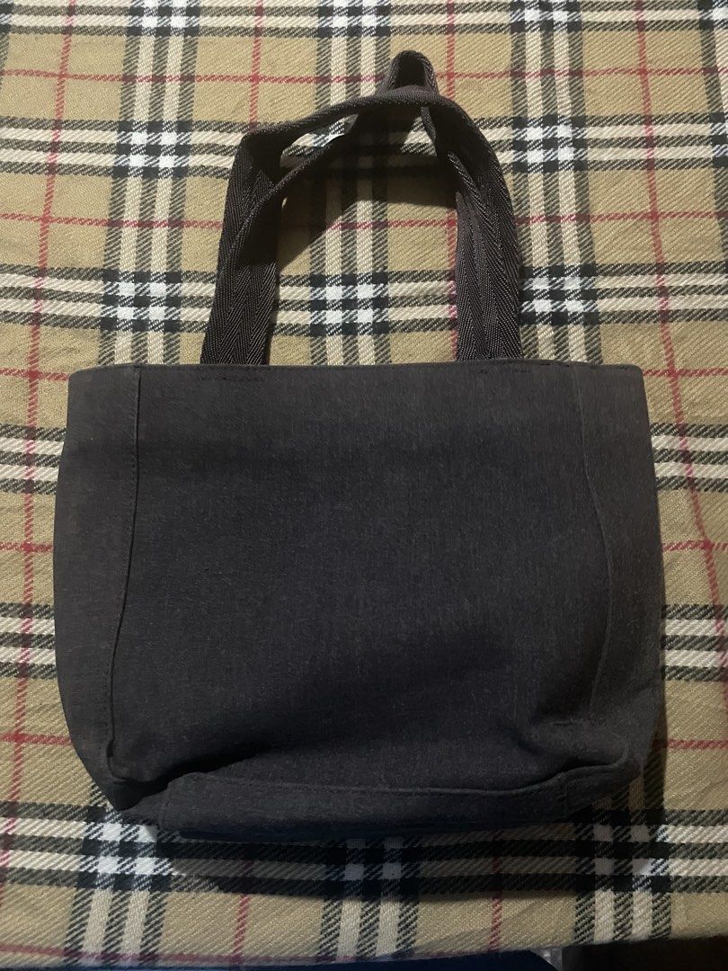 PRADA Canvas Handbag (Category: Luxury Bags & Wallets) located in Iligan City. Submitted by ileganteph (Listing ID 1463825240, Image 3). Description: Prada Logo Outside Prada Metal Plate Inside Holo Inner Lining No major flaws.