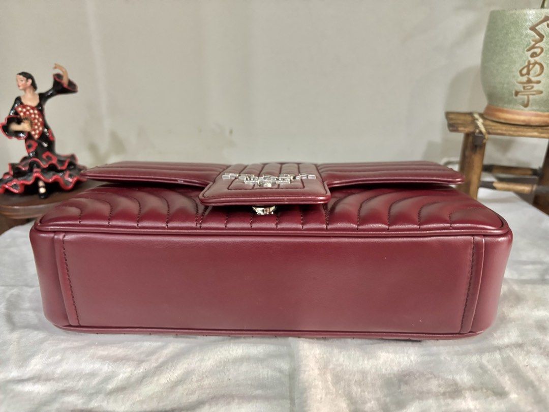 Prada Flap (Category: Luxury Bags & Wallets) located in Quezon City. Submitted by ingridsfinds (Listing ID 1463822290, Image 3). Description: Excellent condition With cards Dustbag.
