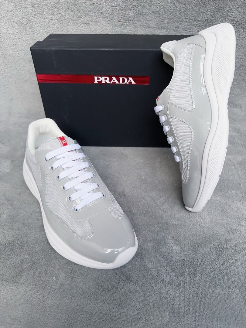 Prada Grey Patent Leather Mesh Sneakers(High-end custom model） (Category: Sneakers) located in Makati City. Submitted by keenstar-c35f66 (Listing ID 1463809057, Image 3). Description: Prada direct from the original factory New couple's casual sports shoes, high-end quality. TW custom double-layer breathable mesh + imported calf leather. The insole is calf leather with perforated design, breathable and comfortable. Original factory vacuum-formed o