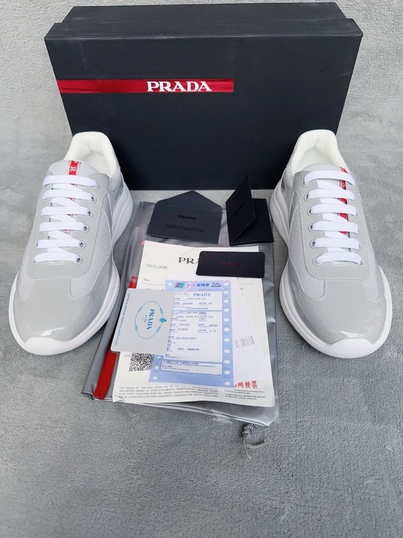 Prada Grey Patent Leather Mesh Sneakers(High-end custom model） (Category: Sneakers) located in Makati City. Submitted by keenstar-c35f66 (Listing ID 1463809057, Image 2). Description: Prada direct from the original factory New couple's casual sports shoes, high-end quality. TW custom double-layer breathable mesh + imported calf leather. The insole is calf leather with perforated design, breathable and comfortable. Original factory vacuum-formed o