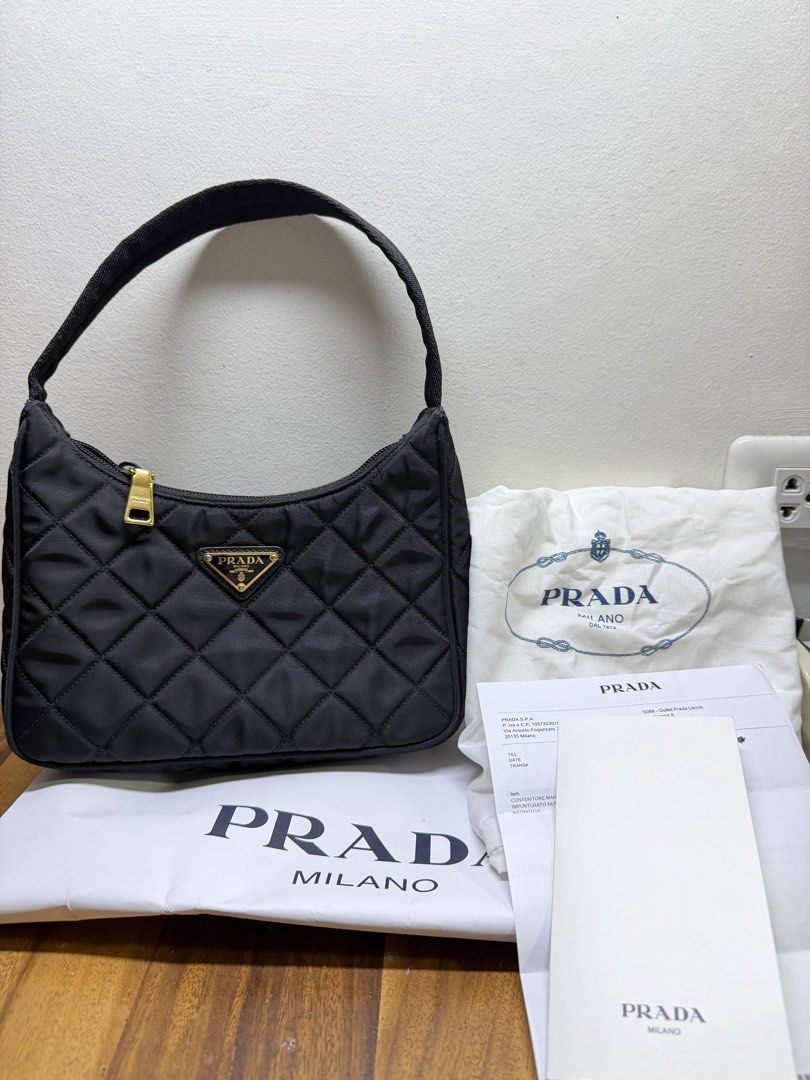 PRADA tessuto nylon shoulder bag (Category: Shoulder Bags) located in Quezon City. Submitted by nabiepom (Listing ID 1463869074, Image 1). Description: 100% Authentic & Guaranteed Original. Triple your money back if proven counterfeit. This is a personally owned and preloved piece, kept in pristine condition with no noticeable flaws—only minimal signs of use. Beautifully maintained and well cared for. Complete with its original dust bag, paper ba
