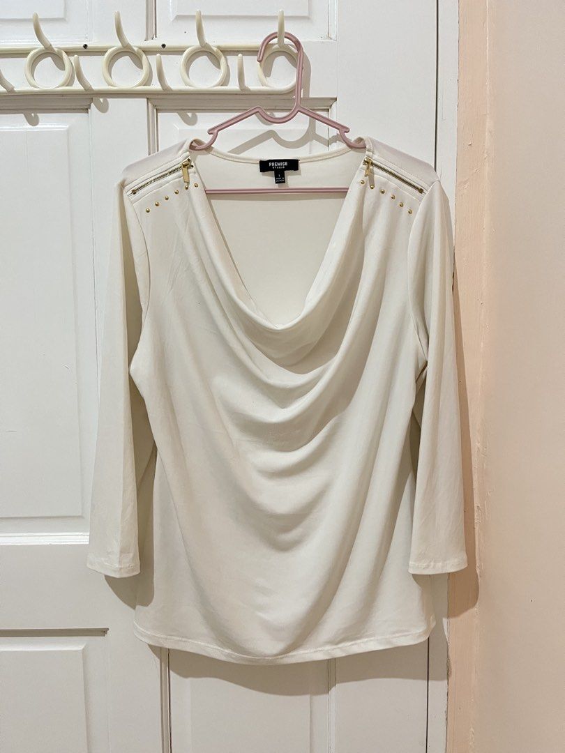 Premise Studio cowl neck blouse Size Large (Category: Longsleeves) located in San Pablo. Submitted by restoredchic (Listing ID 1463892945, Image 1). Description: Premise Studio cowl neck blouse in an off-white/cream shade, featuring 3/4 sleeves and distinctive gold zipper accents along the shoulders. Cleaned and sanitized No flaws Fit for Large Size Measurements : Lay Flat ( in Inches) Length- 24” Chest- 19” Waist- 19” Sleeves - 18” Shoulder to S