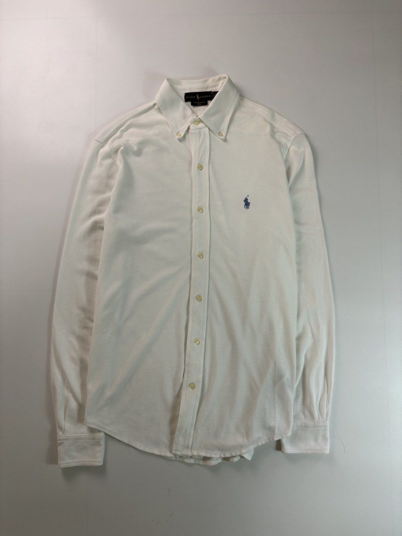 PRL White buttons down polo gold featherweight mesh (Category: Tshirts & Polo Shirts ) located in Tayabas. Submitted by thedecentoutfits (Listing ID 1463894294, Image 1). Description: PRL White buttons down polo gold featherweight mesh Size S/M, 20x27-28 Color rate - 9.8/10 As new condition.